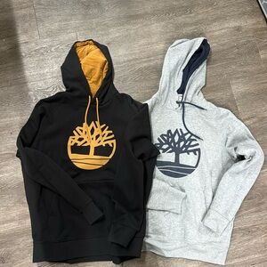 Two practically new Timberland sweatshirts